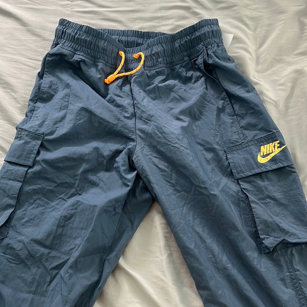 Blue Nike windbreaker joggers